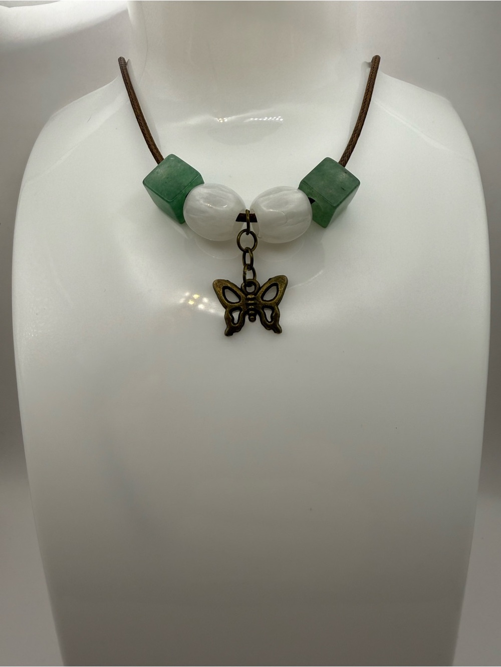 Women's Bronze -Toned Butterfly Necklace Green Aventurine Cubes on a Brown Cord